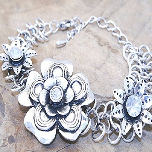 Metal flower bracelet with CZ's. 18cm long + 7cm extension chain.