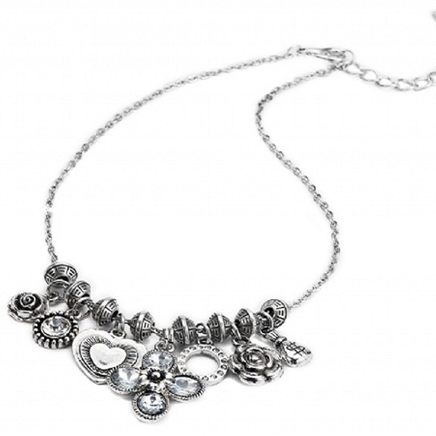 Flower and heart charm necklace in antique silver finish