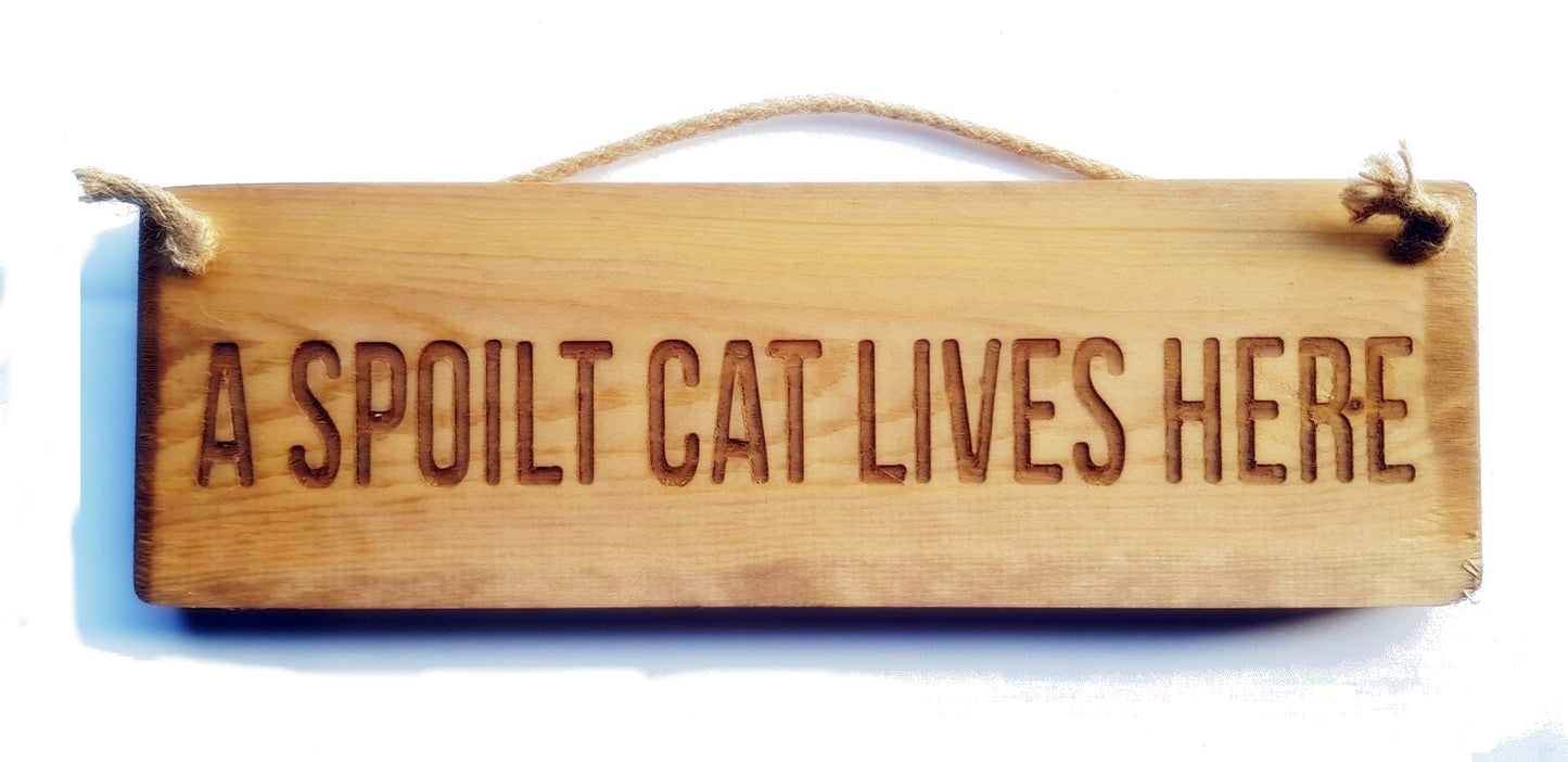 Wooden engraved rustic 30cm Sign Natural  "A spoilt cat lives here"