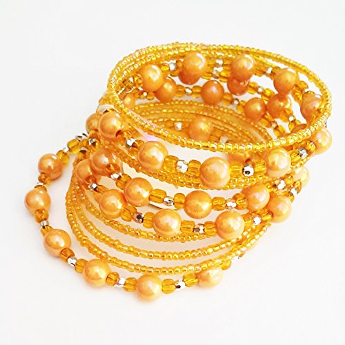 Multi strand Orange bead and balls bracelet